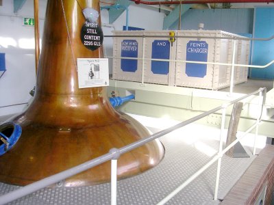 Brass distillation cooling chimney.